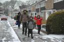 Start of the snowfall. Braving sub-zero temperatures to get to school. Photo: Trevor Porter 59388 1.