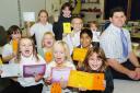 Longmeadow Primary School headteacher Craig Gibbens with achievement award winning pupils	(32506)