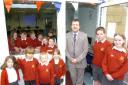 Headteacher Simon White with pupils in the new extension