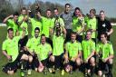 The Castle FC celebrate their WG Parr Trophy win