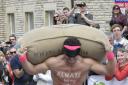 The annual Woolsack Races on Gumstool Hill, Tetbury was open to fund raisers including Joel Hicks from Leicester who raced up the hill blindfolded.......   and succeeded!