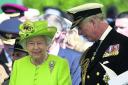 The Queen and the Prince of Wales attend the service of remembrance at the Commonwealth War Graves Commission Cemetery, Bayeux, to mark 70th anniversary of the D-Day landings