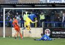 Eddie Jones’ cross is deflected over Bath City goalkeeper Will Henry by his own defender as Chippenham Town open the scoring during the A4 derby on Boxing Day Photo: Richard Chappell