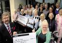 Captain Sylvia Booth and the ladies of Kingsdown Golf Club present a cheque for £3,878 to West Wilts Help for Heroes co-ordinator David Bartholemew