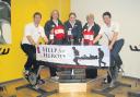 Castle Place staff, from left, Thomas Clifford, Samantha James, Abi Dempsey, Sue Heard and Ryan Spencer get ready for the spinathon