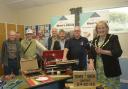 Trowbridge Deputy Mayor Cllr Denise Bates hits the nail along with Kevin Wright, to launch Tom’s Shed at Thomas’ Church Hall.