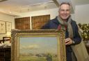 Paul Martin with the Avon Valley painting at his Corsham store