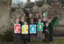 West Ashton CofE Primary School headteacher Alex Blake-Thwaite celebrating with pupils the 'Good' Ofsted rating.