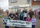 Members of the Trowbridge Town Fairtrade Group celebrate with mayor Cllr Stephen Cooper having the town's Fairtrade Town status renewed.