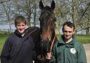 Trainer Neil Mulholland, left, with The Druids Newphew and stable lad James Paget