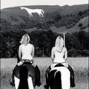 Julia Betteridge of Trowbridge and Annica Bowen of Westbury ride out towards the Westbury White Horse for the July calendar shot