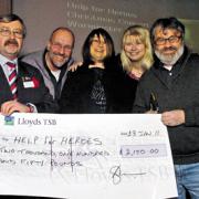 From left, David Bartholomew from Help for Heroes, receives the cheque from Pete Hodges, Val Priddey,  Sally Boyle and director Adrian Cunningham                                                              Photo: Trevor Porter (32406)