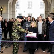 Garrison commander Paddy Tabor hands over the keys to Lorna Owen, PA to Help For Heroes founder Bryn Parry, far right (35502/3)