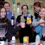 Westbury Youth centre members Amy and Sophie, left, with Tiffany and Lauren, right, youth centre manager Sally Willox and their smoothies