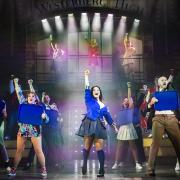 Jenna Innes (centre) as Veronica Sawyer with the company of Heathers The Musical. Photo: Pamela Raith Photography