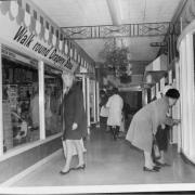 Aspley House shopping arcade, thought to be in the 1960s. There’s a Green Shield stamps poster in the window