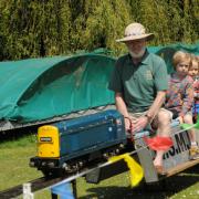 Full steam ahead with Terry Neary of the West Wilts Society of Model Engineers taking visitors for a ride  at Family Fun Day.
