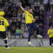 Hampshire Hawks' Liam Dawson (centre) celebrates taking the wicket of Surrey's Tom Curran during the Vitality Blast T20 match at The Ageas Bowl, Southampton