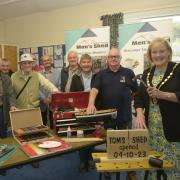 Trowbridge Deputy Mayor Cllr Denise Bates hits the nail along with Kevin Wright, to launch Tom’s Shed at Thomas’ Church Hall.