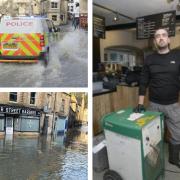 Scott Wheeler cleans up after flooding at his Bradford on Avon Town centre takeaway shop Feast Brothers after the floods in Bradford on Avon