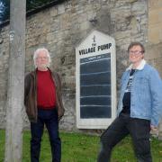 Pete MacGregor (left) hands over the management of the Village Pump folk club to Kieran Moore in November 2020.