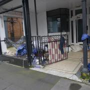 The rough sleepers were camped in the doorway of The Lounge in Roundstone Street.