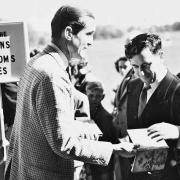 Lord Henry Thynn, the 6th Marquess of Bath, selling guide books at Longleat in 1949.