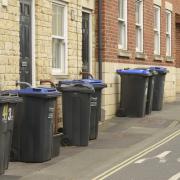 The waste bins left outside in Duke Street, Trowbridge, are partially blocking the pavement for passers-by.