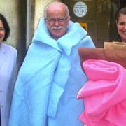 Pam Duckett and head housekeeper Dawn Newman-Burke present the blankets to Cecil Weir
