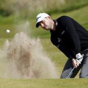 England's David Howell chips out of the bunker on the 14th during day four of the Saltire Energy Paul Lawrie Match Play at Murcar Links Golf Club, Aberdeen. PRESS ASSOCIATION Photo. Picture date: Sunday August 2, 2015. See PA story GOLF Murcar. Photo