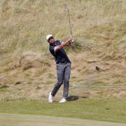 England's David Howell plays from the rough on the sixth during day one of the Dubai Duty Free Irish Open at Ballyliffin Golf Club..