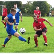 Action from the Wiltshire Sunday Cup tie between Bromham (blue) and Semington. Picture: CADER ESOFF