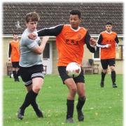 Action from the 5-0 win for FC Libby (orange) over Westbury Railway. PICTURE: CADER ESOOF