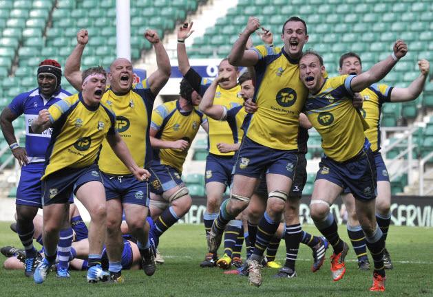 Trowbridge RFC players and fans celebrate victory in the RFU Intermediate Cup match at Twickenham over Leek yesterday.