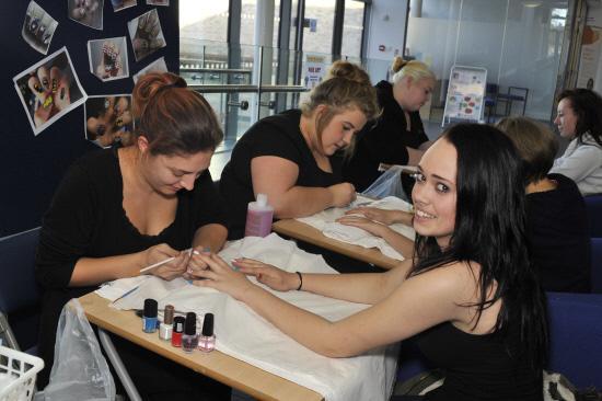 Angel Preece shows off her finished nails painted by Wiltshire College Level 1 student Rebecca Singer