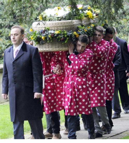 Mourners and flowers at Max Lewis's funeral at St Michael’s Church, Melksham