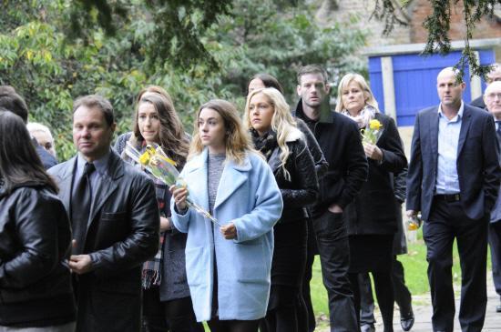 Mourners and flowers at Max Lewis's funeral at St Michael’s Church, Melksham