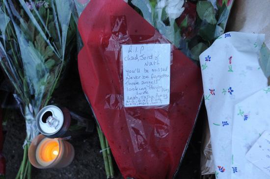 Floral tributes at West Wiltshire Trading Estate, Westbury, to the three young men who died on Friday night