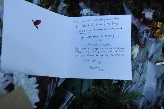 Floral tributes at West Wiltshire Trading Estate, Westbury, to the three young men who died on Friday night. Pictures by Trevor Porter