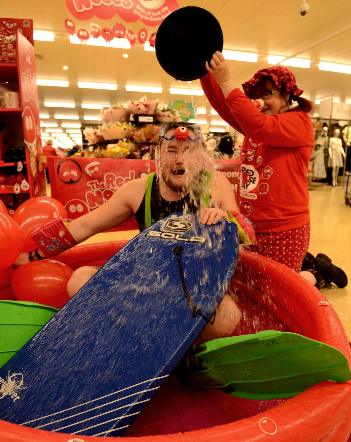 A soaking during Red Nose Day at Sainsbury's in Bradford on Avon. Picture by Clare Green