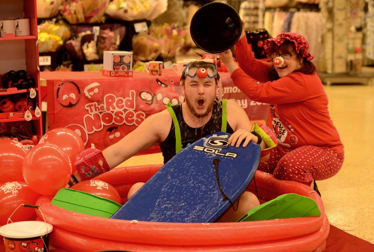 A soaking during Red Nose Day at Sainsbury's in Bradford on Avon. Picture by Clare Green