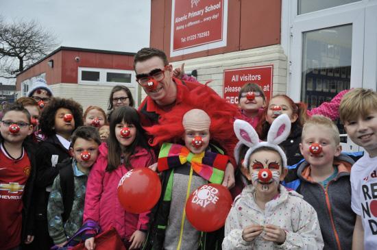 Red Nose Day fun at Aloeric Primary School, Melksham, with headteacher Matthew Nightingale. Picture by Glenn Phillips