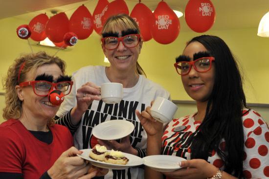 Tea and scones with Sharon Johnston, Julie Burrage and Micia Jordan raising money for Comic Relief at Specsavers in Melksham. Picture by Glenn Phillips
