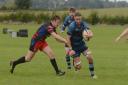 Rugby. BoA (red) v Melksham (blue). Pictured for BoA is Matt Cook and for Melksham is Nick Suter Photo: Siobhan Boyle SMB2817/5.