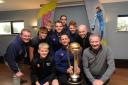 Cricket World Cup Trophy Chippenham . John Rumble Chairman of Chippenham Cricket Club  holds the Cricket World Cup Trophy surrounded  by members of the club.. The Trophy is travelling around Britain to clubs were players of the winning team once played-