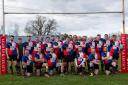 Pewsey Vale Rugby Football Club first XV celebrate winning the Dorset and Wiltshire Two North league title