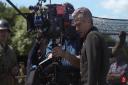 George Clooney filming behind the scenes. Image: Screen Slam.