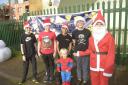 Oliver Brooking (right) with four of his friends took part in the Rudolph & Santa Fun Run in Trowbridge to raise funds for Wiltshire Air Ambulance. Photo: Trevor Porter 69421 -14