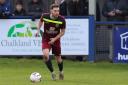 Chippenham Town's Alex Bray in action against Bath City