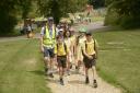 Putting their best foot forward: Years 5 and 6 pupils from St John's Roman Catholic Primary School arrive at  Barton Farm Country Park during the annual pilgrimage to Bradford on Avon.